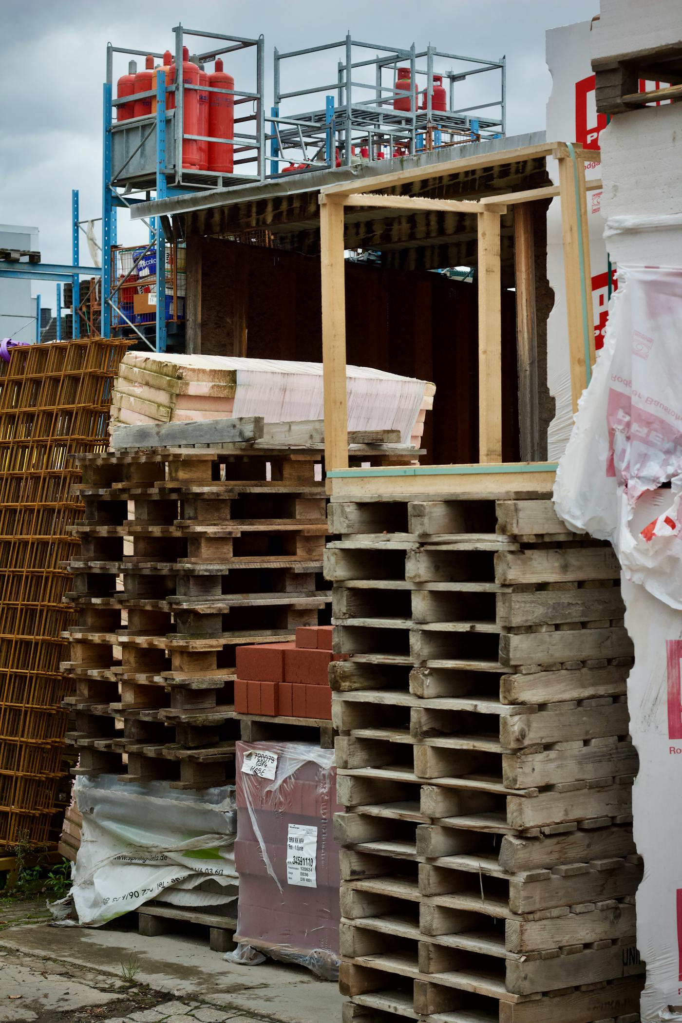 Construction materials and pallets staged for delivery